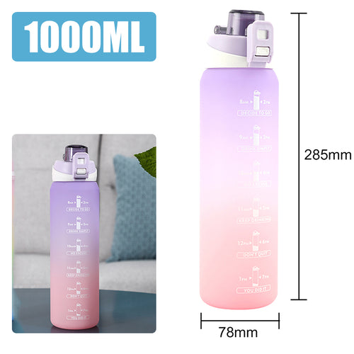 Purple to pink gradient water bottle for fitness and outdoor activities.