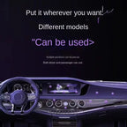 Car interior with dashboard and steering wheel on a black background

