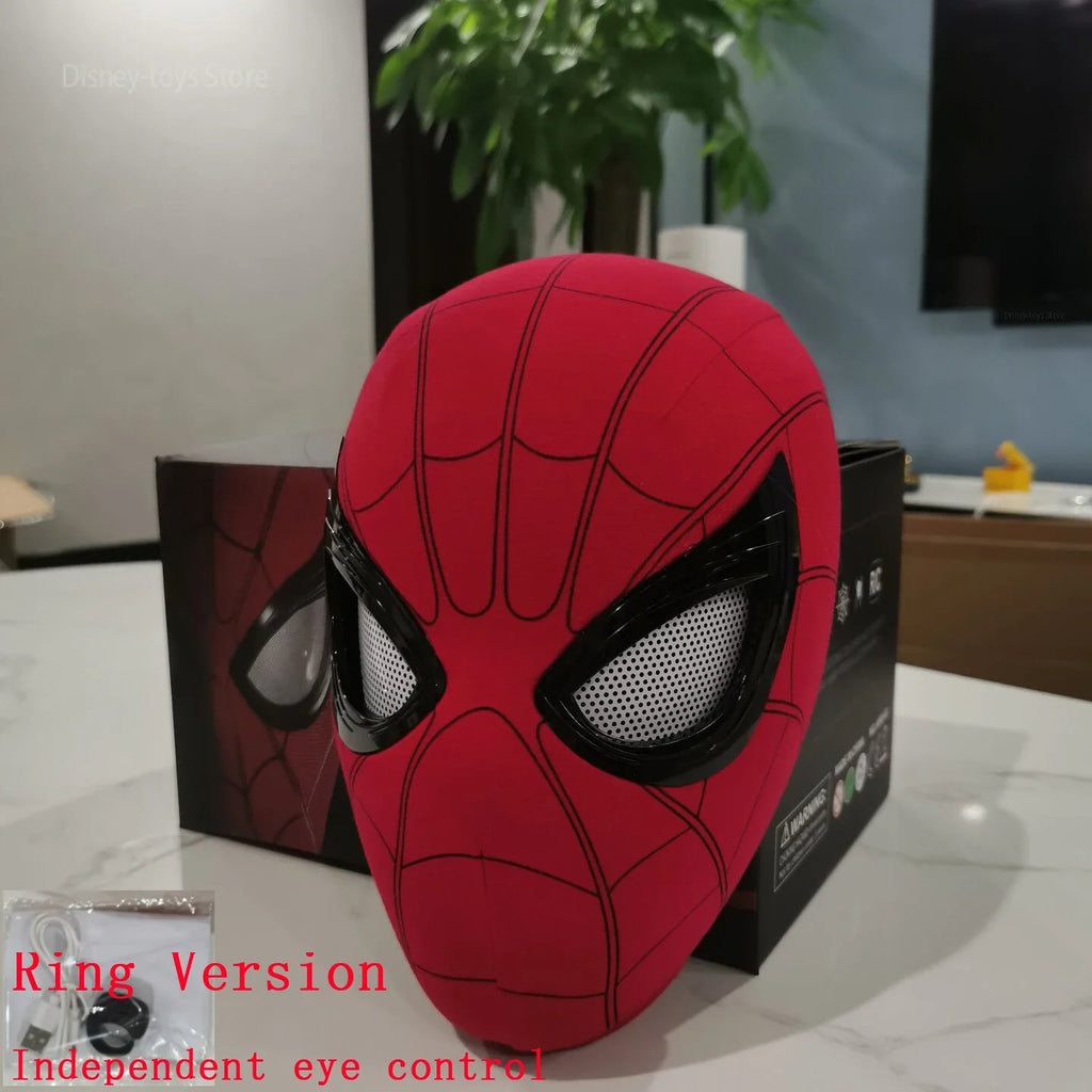 Red superhero mask with black eye lenses on a box in an indoor setting

