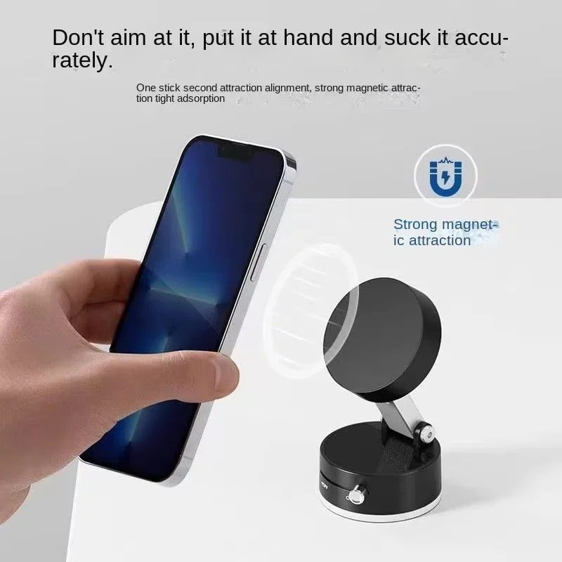 Hand holding a smartphone next to a magnetic phone holder with text about strong magnetic attraction.

