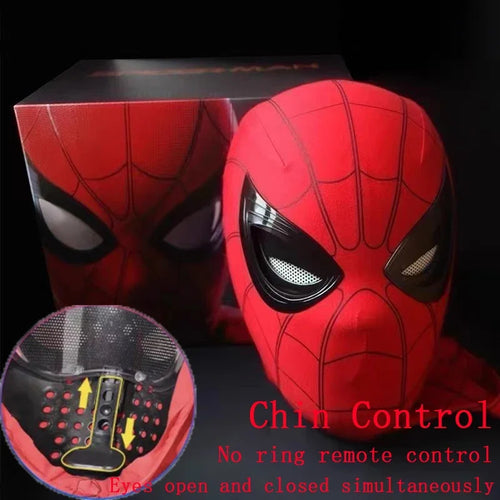 Red superhero mask with spider web design and chin control feature, displayed with packaging.

