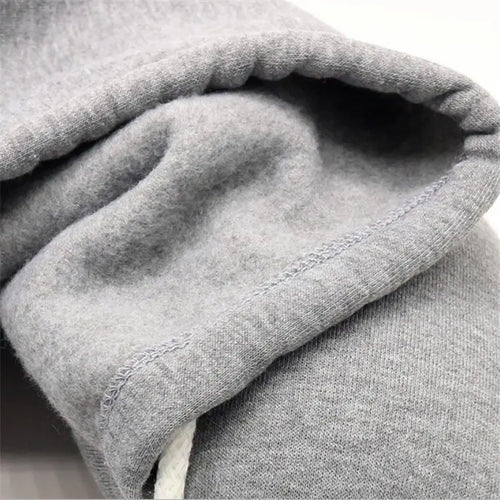 Close-up view of the plush interior fabric of the hooded travel neck pillow.