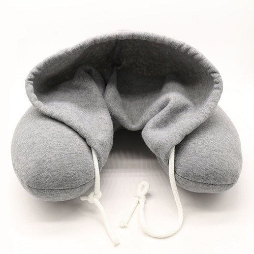 Memory foam hooded neck pillow with adjustable hood for enhanced comfort and support.
