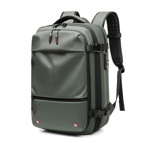 Green vacuum compression backpack with expandable packing capacity and durable construction.