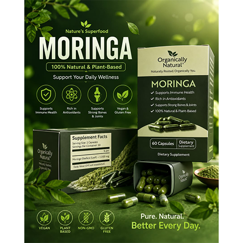Moringa supplement packaging with green leaves on a dark background